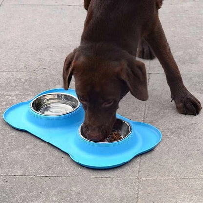 Blue double dog bowl with puppy eating